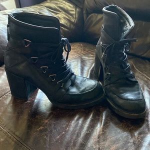 Stuart Weitzman lace up boot heels